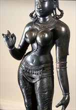 Statue of Parvati identified by the tall conical crown (katakamundra), reincarnation of Sati and consort of Shiva
