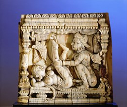 An ivory panel, probably from a bed or a swing, carved with a tantric scene of a couple making love