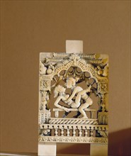 An ivory panel, probably from a bed or a swing, carved with a tantric scene