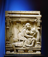An ivory panel probably from a bed or a swing carved with a tantric scene of a couple making love