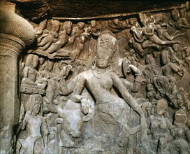 Temple sculpture at Elephanta of Ardhanari, an androgynous deity composed of Shiva and his consort Shakti