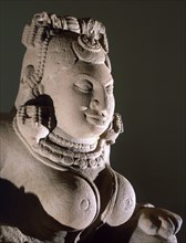Early example of free standing stone sculpture of a creation goddess
