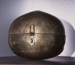 Metalware spherical storage box known as Bhugola or Earth Ball engraved with a representation of the earth as known in Hindu cosmology