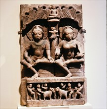 A stele with two seated figures