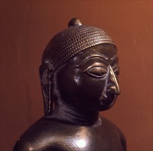 A sculpted head, possibly part of a statue of Gomateshwara, the renunciate son of the first Tirthankara (Fordmaker)