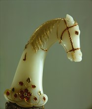Dagger (khanjar), white jade hilt in the form of a horses head, inlaid rubies for eyes and harness
