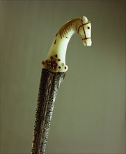 Dagger (khanjar), white jade hilt in the form of a horses head, inlaid rubies for eyes and harness