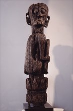 A male figure rising from a tree