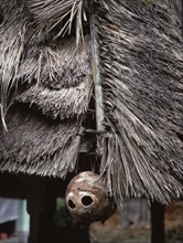 Talisman hung on a thatched rice bin to protect the contents and promote crop fertility