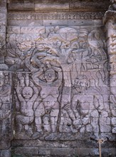 Stone relief on a temple wall at Sangsit, Buleleng