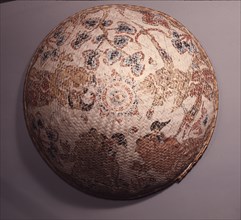 Basketry bowl painted with mythical figures, used as a cover for temple offerings