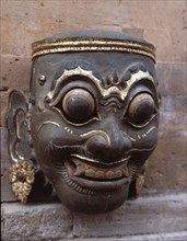 A Royal mask of the strong and coarse type, used in court wayang wong performances of the Hindu epics, especially the Ramayana