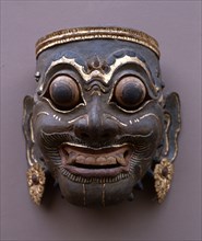 A Royal mask of the strong and coarse type, used in court wayang wong performances of the Hindu epics, especially the Ramayana