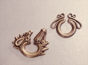 Lost wax cast brass earrings, probably presented to a bride by the grooms family as part of ceremonial gift exchange at weddings