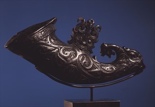 A buffalo horn container with the face of singa, the Batak version of the cosmic serpent Naga, used by shaman to store magic medicine