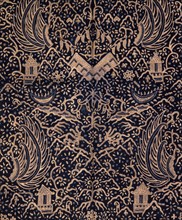 A batik kain depicting stylised wings, shrines and sacred mountains