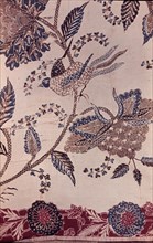 Detail of a batik sarong with a bird and flower design