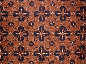Detail of a batik kain panjang, (a cloth worn about the hips), with a design known as ganggong rante, chain of water plants, symbolising interconnection and linking