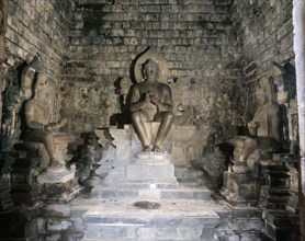 Statues of Buddha and Bodhisattvas in Chandi Mendut, one of the several temples associated with Borobudur