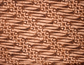 A batik kain with a variant of the scrolled parang motif once restricted to royal use