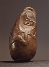 An ancient Indonesian cult object, thought to be a snake god or demon