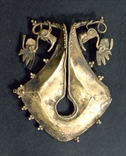 Gold earring, mamuli, in the shape of female genitals