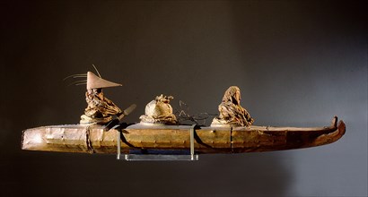 Two figures in a kayak   a soul boat