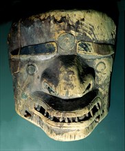 An undated dance mask found in a burial cave on Unga island