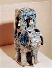 Incense burner with blue iridescent glaze in the form of an elephant