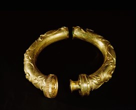 Tubular gold torque which was probably a votive object