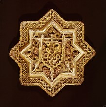 A star shaped tile of stucco