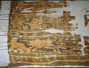 Textile fragment with depiction of an animal hunt