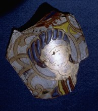 Fragment of a tile with decoration of a courtier
