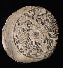 Relief which was cut down to create a crescent moon