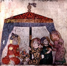 Revellers in a tent from the Maqamat of al Hariri, a series of tales