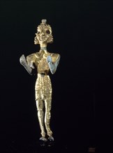 Canaanite gold and silver foil covered bronze figure of Baal