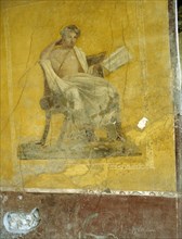 Fresco painting of a man reading