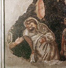 Detail from a mosaic depicting a group of masked actors preparing for a play