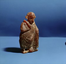 An amber statuette of an actor