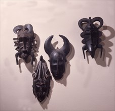 A selection of masks of the Kpelie type used in funerals and other ceremonies of the mens Poro society