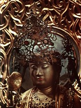 Amida Buddha with glass eyes and crystal mark on the forehead