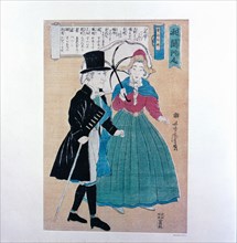 A well to do European gentleman with his Japanese wife