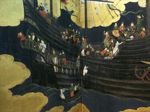 Detail from a folding namban jin or southern barbarian screen depicting a harbour scene recording the arrival of exotic looking Portuguese merchants in Japan
