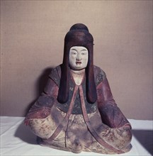 Statue of the Shinto goddess Nakatsu Hime Zo wearing the robes of a court lady