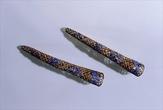Nail protectors worn by Tzu hsi, Empress Dowager of China, over her six inch long fingernails