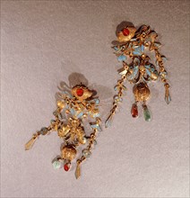 Pair of earrings made from gold, enamel and semi precious stones