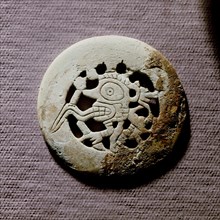 Shell gorget engraved with religious image