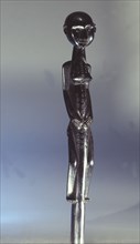 A staff with figurative finial