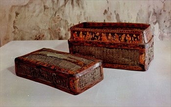Found in a Han tomb in the Chinese colony of Lelang in north Korea (Nangnang), these lacquered baskets bear representations of model sons