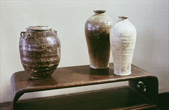 Two vases and container with a lid